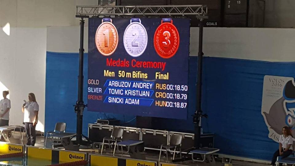 Medal screen at the 2016 World Championships in Volos: Kristijan Tomić, Croatia, silver in the men's 50 m bi-fins